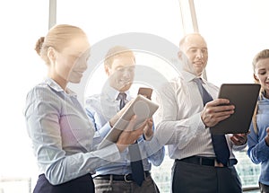 Business people with tablet pc and smartphones