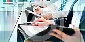 Business people taking notes, geometric pattern