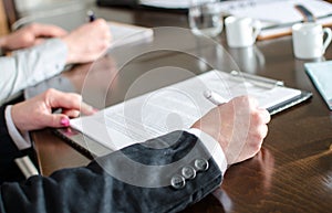 Business people taking notes