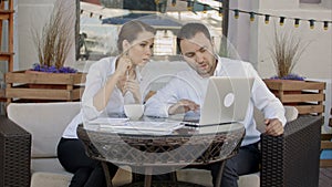 Business people talking in a cafe