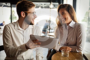 Business people talking and laughing together