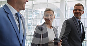 Business people talking in a modern office building