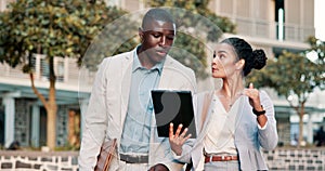 Business people, talking or walking with tablet in city to work or office in conversation or outdoor discussion. Travel