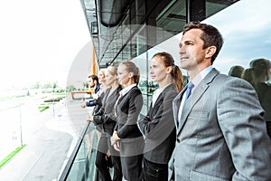 Business people team at the balcony