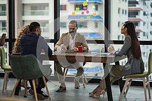 Business people team colleagues in modern office. Man and woman meeting conference and presentation in room