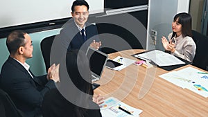 Business people team confident working and communicating together and were clapping applauding