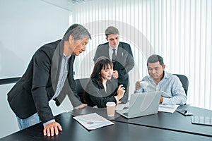 Business people team work while working in board room, design project, discussing ideas,discuss financial statistics together