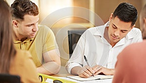 Business, people and team writing in notebook for meeting, planning and project collaboration in office. Man, group and