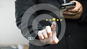 Business people thumb up positive thinking score a list of smile and stars for satisfaction on mobile service, online transactions