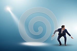 Business people under the spotlight