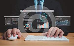 Business people use computers to analyze business and manage corporate data, business analytics with charts, metrics and KPIs to