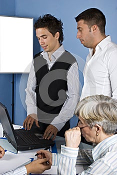 Business people using a laptop