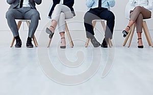 Business people waiting at recruitment company for a job interview or hiring meeting. Closeup of a group of employees