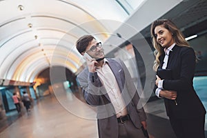 Business people waiting for subway transportation