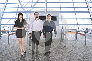 Business people walking in the airport terminal