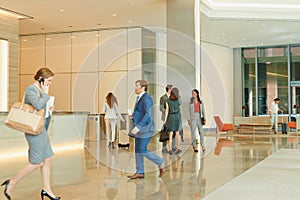 Business people walking through an airport terminal for business travel. Business people walking through an airport