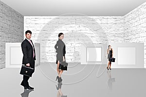 Business people walking on art gallery