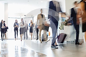 Business people walking at convention center