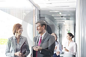 Business people walking in corridor