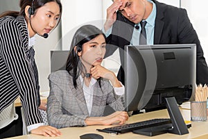 Business people wearing headset feel unhappy working in office