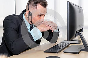 Business people wearing headset feel unhappy working in office
