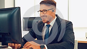Business people wearing headset working in office