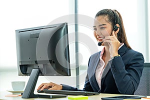 Business people wearing headset working in office