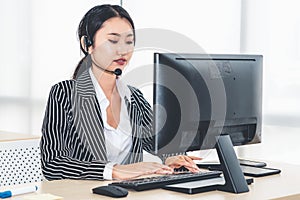 Business people wearing headset working in office