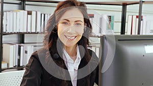 Business people wearing headset working in office