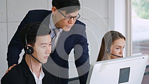 Business people wearing headset working in office