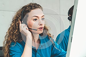 Business people wearing headset working in office