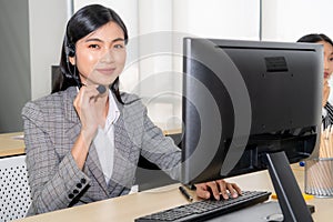 Business people wearing headset working in office