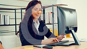 Business people wearing headset working in office