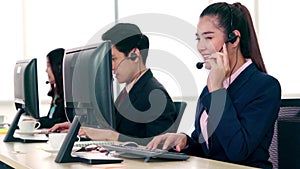 Business people wearing headset working in office