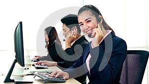 Business people wearing headset working in office