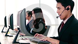 Business people wearing headset working in office