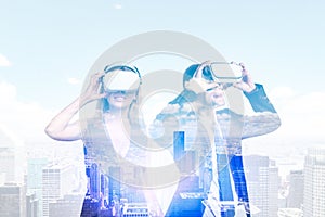 Business people wearing vr glasses, man and woman with skyscrapers