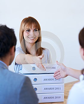 Business, people, woman and handshake with recruitment, documents and achievement in a workplace. Staff, employers and