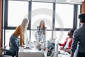 Business people at work in a busy luxury office space