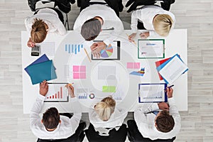 Business people work with statistics photo