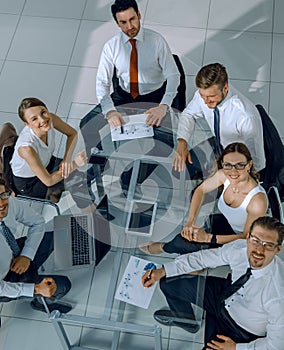 Business People Working Around a Conference Table