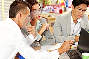 Business people working around table