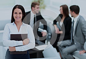 Business people working around table in modern office