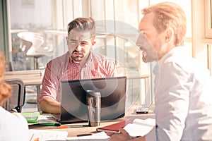 Business people working in board room in office