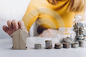 business people working at desk with piggy bank box.business finance saving and investment concept. hand put money coin into piggy