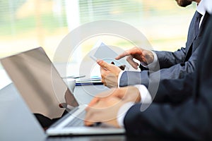 Business people working with digital tablet and laptop