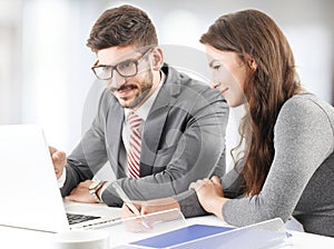 Business people working on laptop