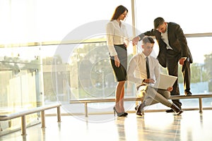 Business People working on a laptop. Team work