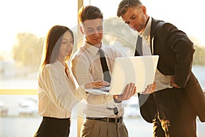 Business People working on a laptop. Team work