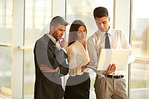 Business People working on a laptop. Team work